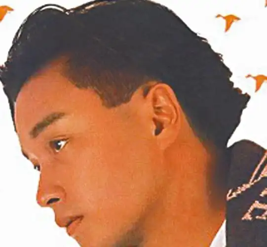 造型4:1989年哥哥的鸭尾头疯靡一时,差不多全港大部分年青男孩都是吹