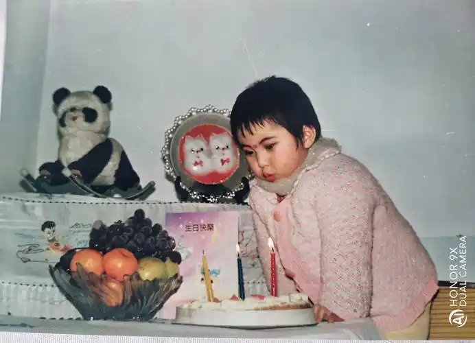 这是女儿儿时,三岁左右的照片