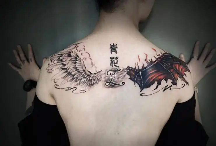 天使恶魔翅膀纹身图片_背部新传统翅膀纹身图案(3)_重庆市纹身店