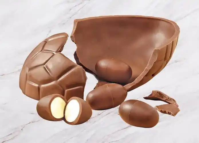 chocolate egg filled with tiny milk chocolate crème eggs