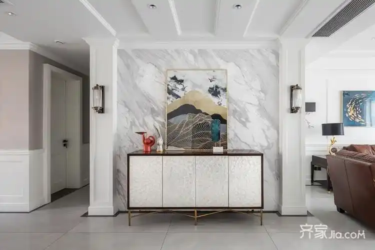 入户正对的玄关端景,灰白色的大理石背景,搭配一款简约质感的玄关柜