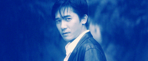 无间道gif梁朝伟gif帅气gif眨眼gif