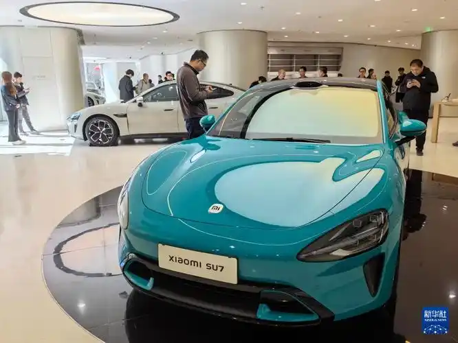 新华社记者 鞠焕宗 摄69692021年,小米集团宣布进军电动汽车领域.