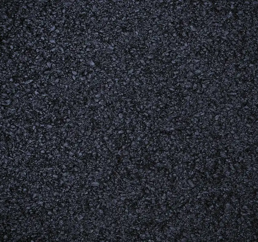 沥青,排队的新鲜沥青的纹理关闭.路面.