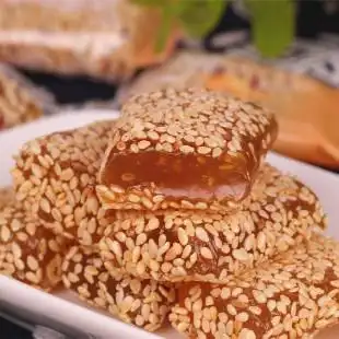 五哥 四川特产 软糖原味牛皮糖零食 成都小吃五哥芝麻牛皮糖140克/袋