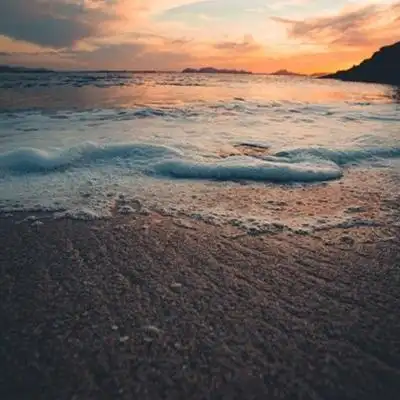 夕阳风景头像好看夕阳下的海滩图片