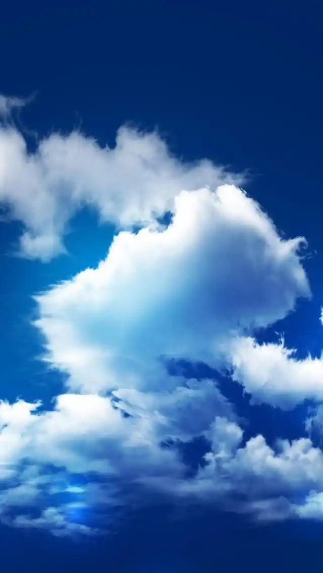 有洁白的云朵,纯美宁静的蓝色天空,喜欢这款唯美蓝色天空手机壁纸的