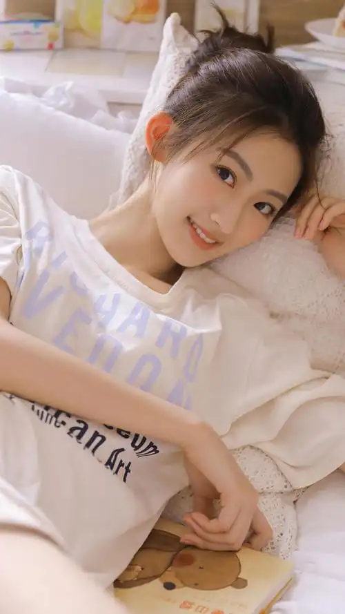 丸子头美女清纯写真图片手机壁纸