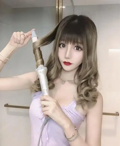 卷发棒伤头发吗(电卷发棒伤发吗)