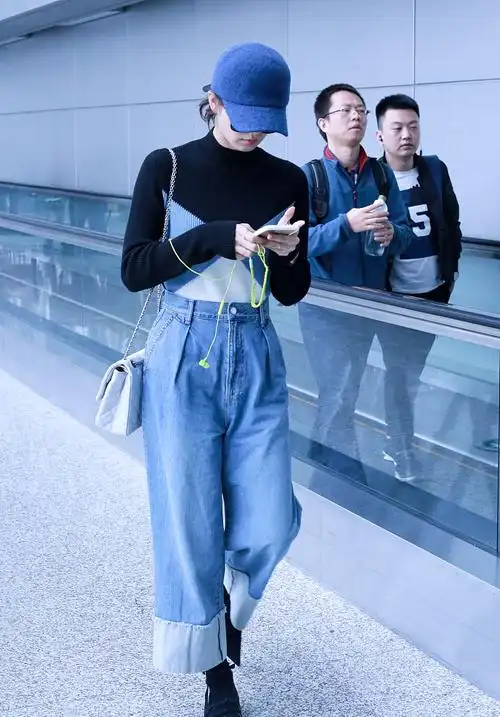 刘诗诗蓝色系温暖清新机场街拍写真图片