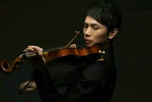 小提琴演奏家·田晖,易多拉小提琴教材副主编.