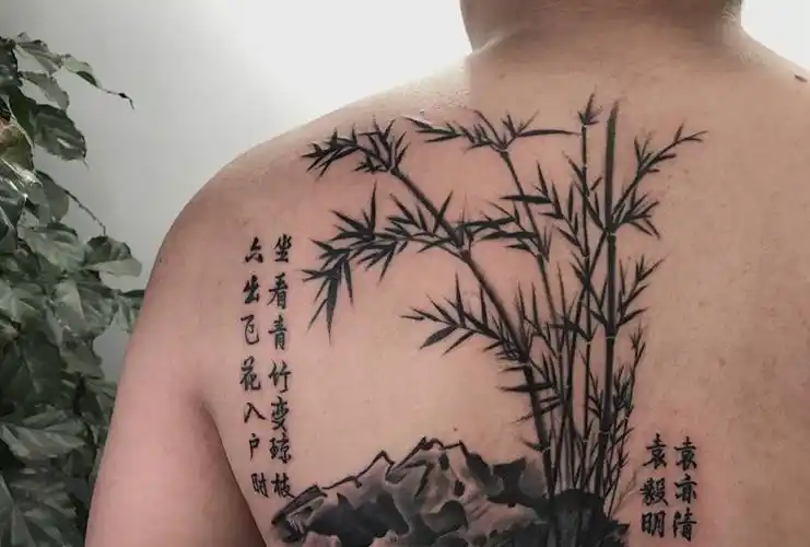 竹纹身图片_肩部背部水墨竹子古诗毛笔字纹身图案(2)_山东省威海市