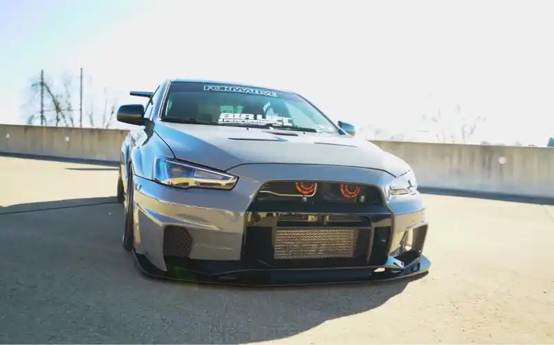 【jdm】三菱evo 这才叫车嘛 大尾翼 合金轮圈 跑车方向盘_哔哩哔哩