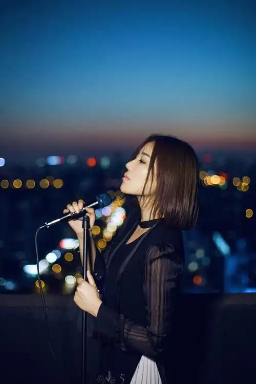 周渔(中国女歌手)_尚可名片