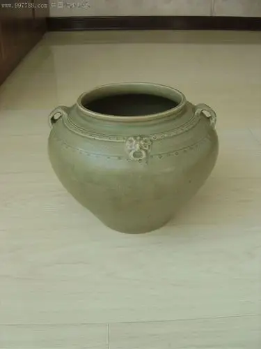 西晋越窑青釉铺首双系罐.高:18厘米