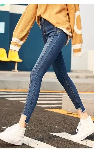 2018春款新品修身高腰明线裤脚不规则毛边女款牛仔裤小脚裤九分裤