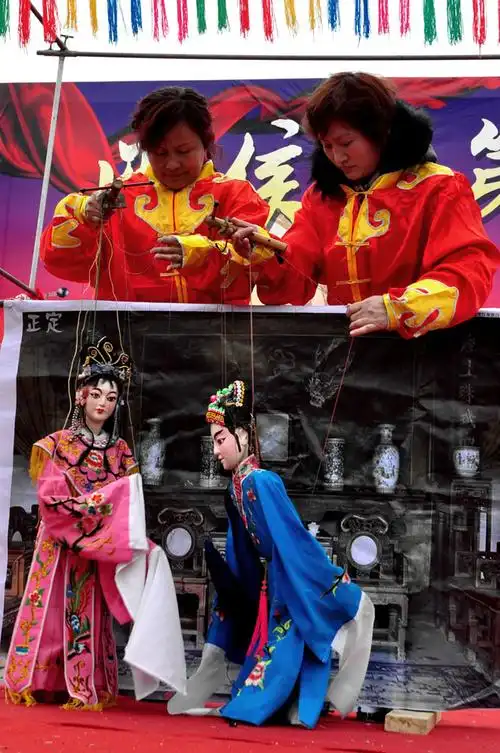 指尖上的艺术——龙屿提线木偶