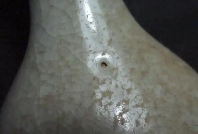 瓷器微观鉴赏汝窑瓷器的返铅现象与紫晕光