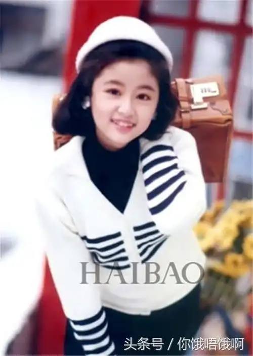 小时候的照片也看得出来是刘涛,但是比较土气.黎姿.