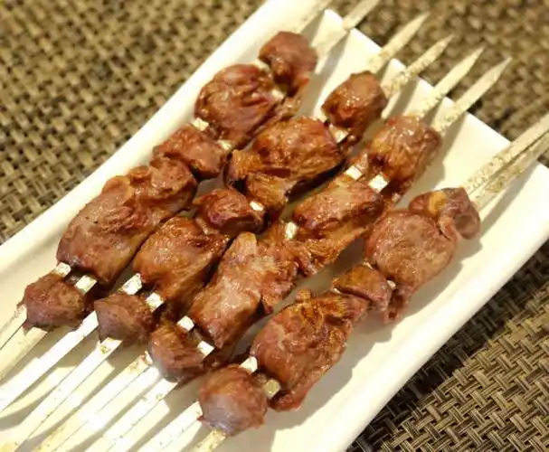 北京火爆6年的『龙娃烤羊腿_手机搜狐网