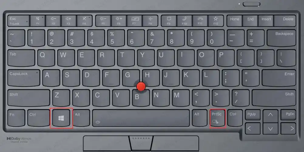 按下键盘上的如图所示win键 prtsc两个按键,会将当前屏幕内容整个截图