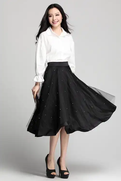 黑色纱裙半身裙搭配什么上衣好看(秋冬黑色纱裙怎么搭配)