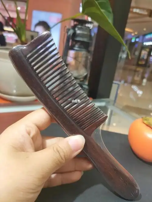 谭木匠小叶紫檀手柄梳—逸云