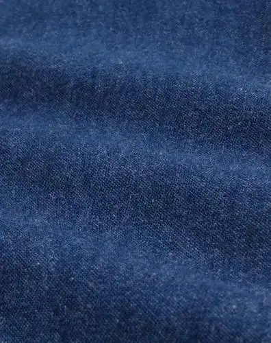 中蓝色纯棉双标袋可卷袖牛仔衬衫