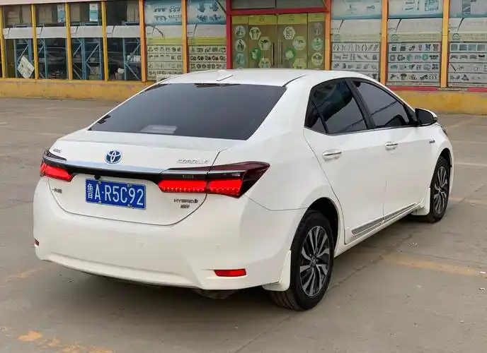 16年混合动力丰田卡罗拉,全4s保养女士用车,随车2万改装白送.