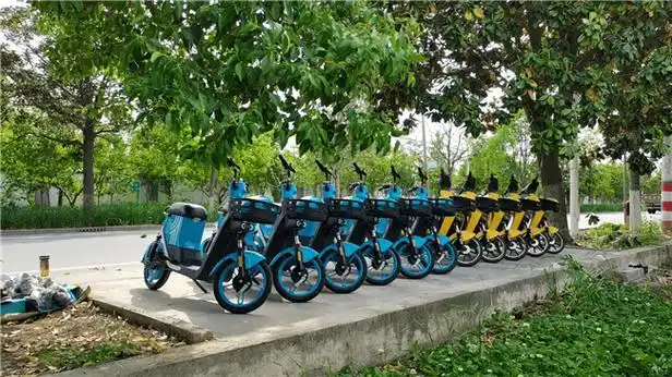邳州首个社区共享电动自行车停放点投入使用_电动车_居民_问题