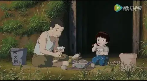 萤火虫之墓:漆黑的夜空中,萤火虫照亮了小女孩的坟墓