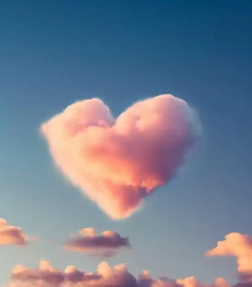 粉色爱心云朵蓝天中的白云风景图