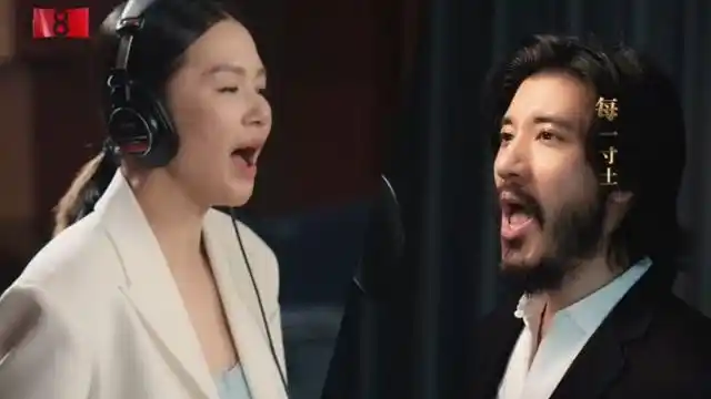 谭维维和王力宏演唱电视剧大决战的主题曲《寸心》