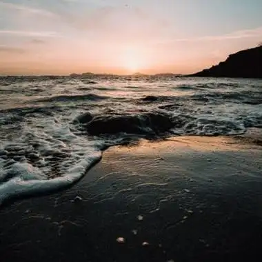 夕阳风景头像好看夕阳下的海滩图片