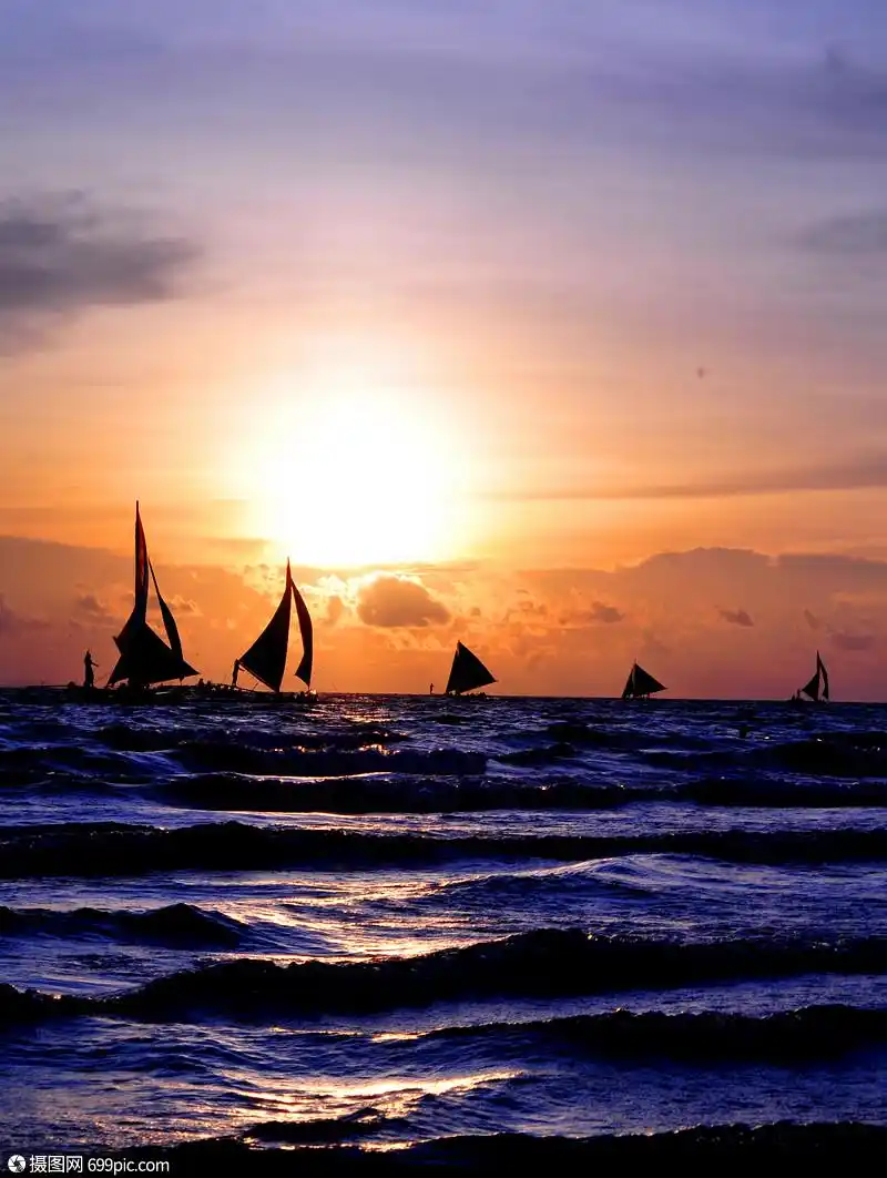 帆船日落夕阳海边图片