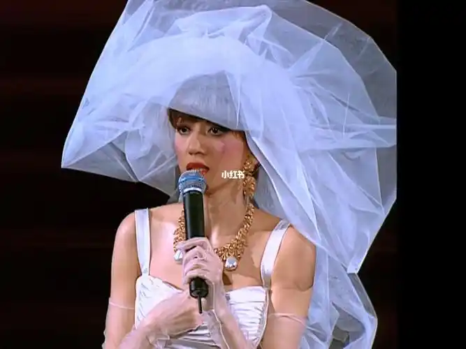 夕阳之歌梅艳芳金曲现场穿婚纱嫁