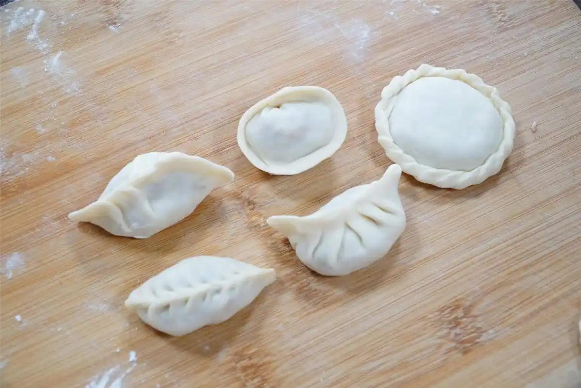 饺子包法简单易学(手把手教5种又快又好看饺子包法图解)-四五百科