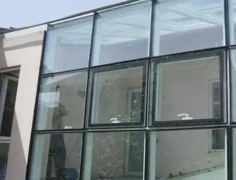 玻璃幕墙看起来现代感很强,自己在农村建小楼用玻璃幕墙合适吗 - 乡村