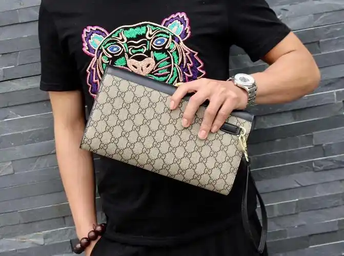 gucci官网新款男包小牛皮男士包包gucci男士手拿包图片