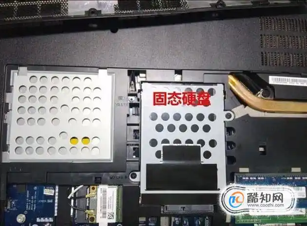 找到机械硬盘,然后把固定螺丝拆下后再把机械硬盘拆下