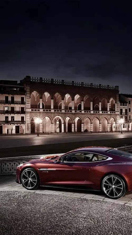 壁纸 阿斯顿·马丁am310红色跑车在城市夜景 2560x1600 hd 高清壁纸