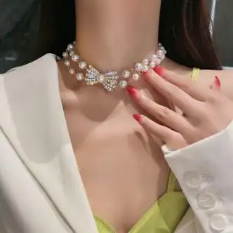 娜塔纳秋冬轻奢长款珍珠毛衣链气质项链女多层锁骨链蝴蝶结珍珠项链