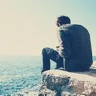 真人清新男生在海边的头像图片