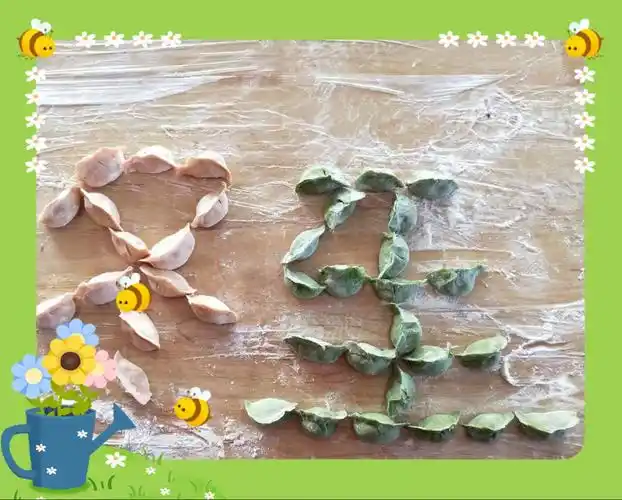 传说冬至吃饺子所以用饺子摆成冬至两个字.