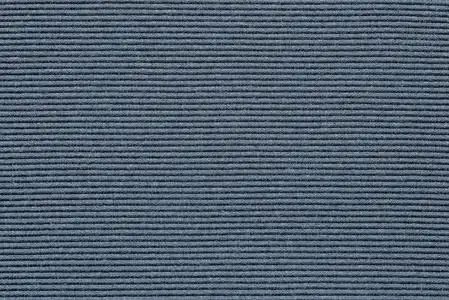 的背景或墙纸与抽象针织纹理的织物或纺织材料的特写蓝灰色的颜色照片