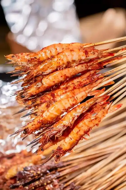 火候时间刚刚好,虾壳被烤得焦香,虾肉结实饱满鲜美