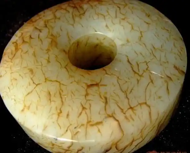 右图是古玉牛毛纹真品.