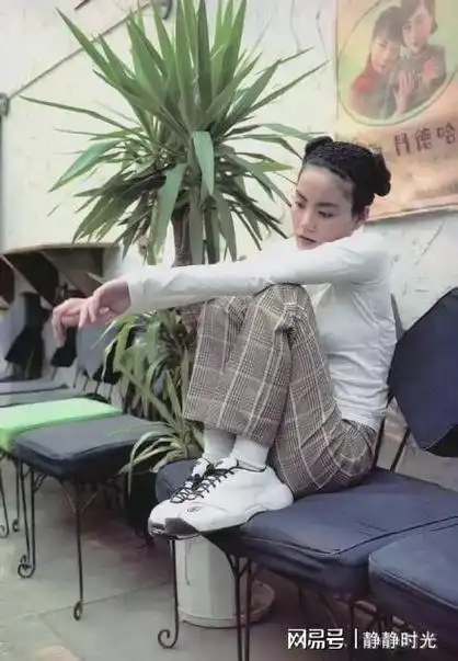 1997年28岁的王菲整了个哪吒头造型