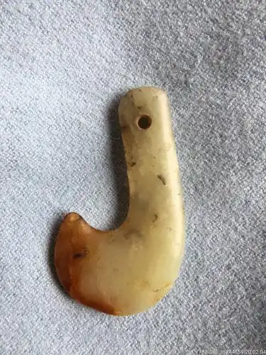 夏家店文化赵宝沟文化勾云佩勾子靴形器_岫岩玉_第1张_7788玉器收藏