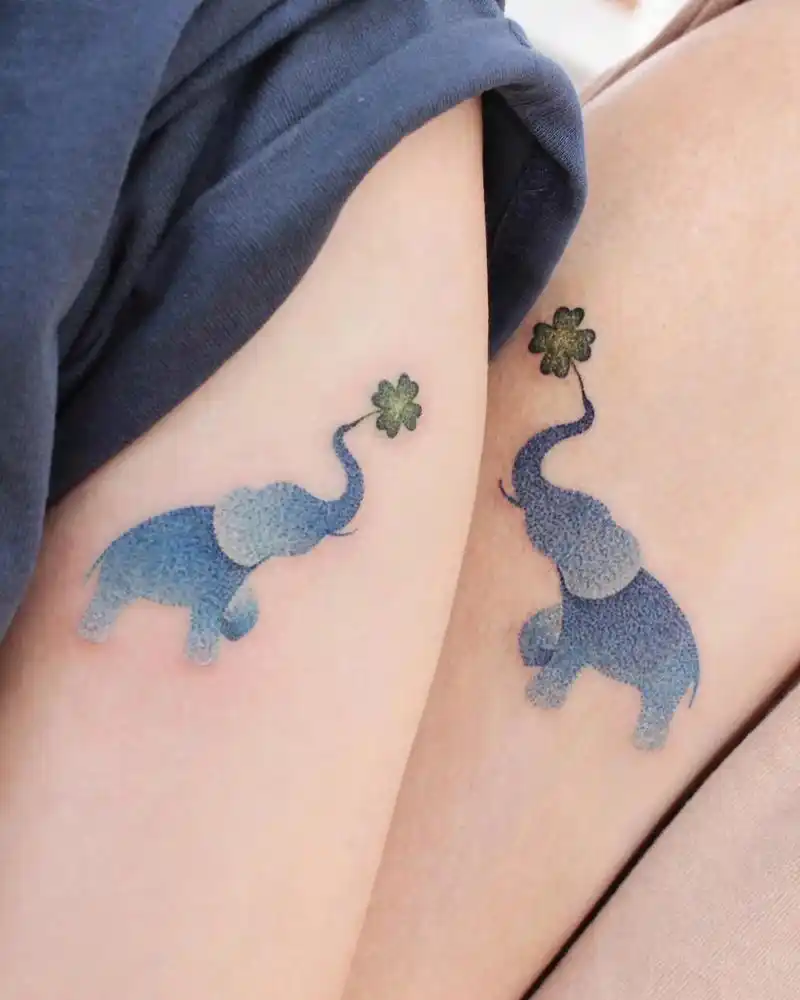 情侣刺青:小象与四叶草,心之所"象",遇见你是我的幸运#情侣 - 抖音